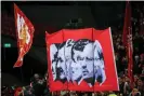  ?? Photograph: Robbie Jay Barratt - AMA/ Getty Images ?? fans hold up a banner depicting their successful managers that includes Rafael Benítez in February 2020.
