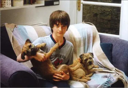  ??  ?? Teen spirit: Daniel Radcliffe, pictured in his family’s west London home in 2002 when he was 13, identified with new-found relatives