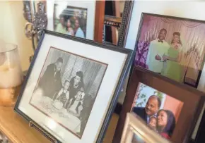  ??  ?? Martin Luther King III’s home, in Atlanta’s Buckhead neighborho­od, is decorated with family portraits showing him and his father, the Rev. Martin Luther King Jr.