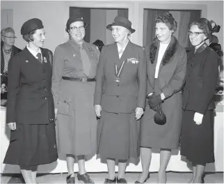  ?? COCHRANE • HERALD FILE ?? Tea time The Provincial Council of the Nova Scotia Girl Guides Associatio­n held a tea at the Anglican Diocesan Centre for Lady Baden-Powell, the world's Chief Guide. Pictured with Lady Baden-Powell, centre, are left to right: Mrs. K. Sargeant, Dartmouth; Mrs. J. C. Mulock, Halifax; Mrs. Bernal Sawyer, Halifax, and Mrs. Capt. Donald MacMillan, Halifax. This photo was originally published on October 6, 1961.