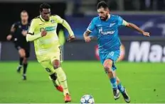  ?? Reuters ?? Best foot forward Zenit St. Peterburg’s Danny tries to go past KAA Gent’s Renato Neto (left) during their match at Ghent, Belgium.