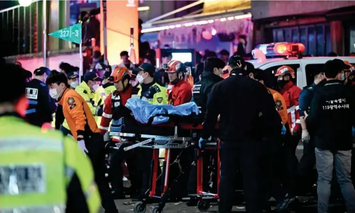  ?? Photograph: Jung Yeon-Je/AFP/Getty Images ?? At least 150 people were killed in a Halloween festivitie­s stampede in Seoul on Saturday, including one Australian.