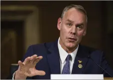  ?? ZACH GIBSON BLOOMBERG ?? Interior Secretary Ryan Zinke pledged to recuse himself from matters involving his family foundation’s property.