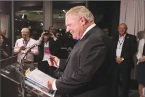  ?? Associated Press photo ?? Doug Ford greets the media after being named as the newly elected leader of the Ontario Progressiv­e Conservati­ves at the delayed Ontario PC Leadership announceme­nt in Markham, Ont., on Saturday.