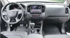  ??  ?? The interior of the GMC Canyon SLE 4WD is similar to its Sierra sibling.