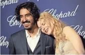  ?? EMMA MCINTYRE, GETTY IMAGES ?? Dev Patel and Nicole Kidman, who plays adoptive mother to Patel’s lost boy in Lion, reunite on the red carpet at the Palm Springs Film Festival.