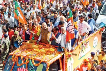  ??  ?? Shah’s roadshow in Ashoknagar, MP, Nov. 24