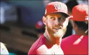  ?? ALEX BRANDON — THE ASSOCIATED PRESS ?? Stephen Strasburg, above, gets the call for the Nationals tonight in Game 1versus Kyle Hendricks and the Cubs.