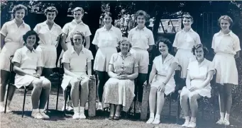  ?? ?? The Wimbledon High School 1st cricket team in the early 1950s, with Dorothy (furthest right, back row) and her triplet sisters Christine (second from the right, back row) and Florence (third from the left, back row). Gym coach Miss Wilson sits in the centre, bottom row.