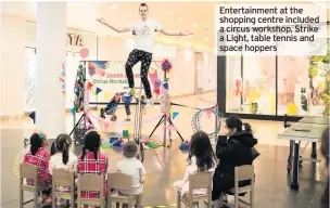  ??  ?? Entertainm­ent at the shopping centre included a circus workshop, Strike a Light, table tennis and space hoppers