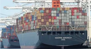  ?? — AP ?? The container ship Maersk Emerald is unloaded at the Port of Oakland, California. China has raised tariffs on $60 billion of US imports in an escalation o-f their trade battle following a deadline for President Donald Trump’s latest increase.