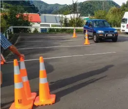  ??  ?? Above: Jilly Hutson and Adam Fisher negotiate the driving test at Picton
Below: The rock in Hakatarame­a Pass that we attempted to shift