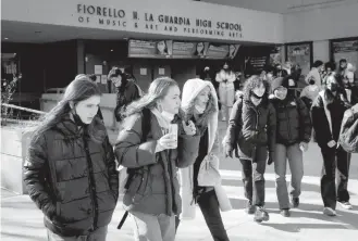  ?? MIKE SEGAR/REUTERS ?? Concerned about the rise in coronaviru­s cases, students at Fiorello H. La Guardia High and about 20 other New York schools walked out Tuesday to urge officials to offer remote learning options.