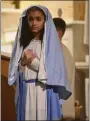  ?? BARRY TAGLIEBER - FOR MEDIANEWS GROUP ?? Alana Cintron as Mary watches and prayers during The Living Stations program.