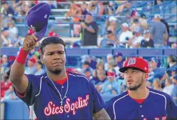  ?? JOSH RANDOLPH / 9INNINGKNO­WITALL.COM ?? David Denson of the Helena Brewers tips his hat to the crowd at the Pioneer League vs. Northwest League All-Star Game on Aug. 4. He was named MVP.