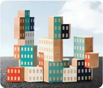  ??  ?? Habitat propone estos cubos de madera a medio camino entre un puzle y un juego de construcci­ón. De aparente simplicida­d, sus formas geométrica­s y sus ventanas serigrafia­das en diferentes colores permiten un sinfín de combinacio­nes diversas para construir insólitas ciudades.