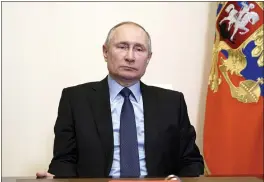  ?? ALEXEI DRUZHININ, SPUTNIK, KREMLIN POOL PHOTO ?? Russian President Vladimir Putin chairs a Security Council meeting via video conference at the Novo-Ogaryovo residence outside Moscow on March 12.