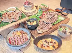  ??  ?? Dishes prepared with Australian dry-aged beef at Praya Kitchen buffet restaurant, Bangkok Marriott The Surawongse.