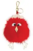  ??  ?? H&M’s Chinese New Year collection, sold exclusivel­y in some Asian-based markets, includes a fuzzy purse accessory and red tassel earrings.