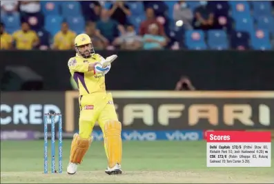  ?? (Sportzpics for IPL) ?? Mahendra Singh Dhoni cracks a boundary during Qualifier 1 clash of the Indian Premier League against Delhi Capitals at the Dubai Internatio­nal Stadium in UAE on Sunday.