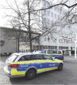  ??  ?? GAGGENAU: Police guard near the town hall in Gaggenau, Germany. German authoritie­s say they have evacuated the town hall in Gaggenau after receiving a bomb threat, one day after the town withdrew permission for a local venue to host a rally by Turkey’s justice minister. — AP