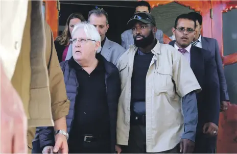  ?? EPA ?? UN special envoy for Yemen Martin Griffiths, left, escorts Houthi rebels to peace talks in Stockholm