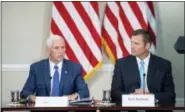  ?? AP PHOTO/ANDREW HARNIK, FILE ?? In this Wednesday, July 19, 2017 file photo, Vice President Mike Pence, left, accompanie­d by Vice-Chair Kansas Secretary of State Kris Kobach, right, speaks during the first meeting of the Presidenti­al Advisory Commission on Election Integrity at the...