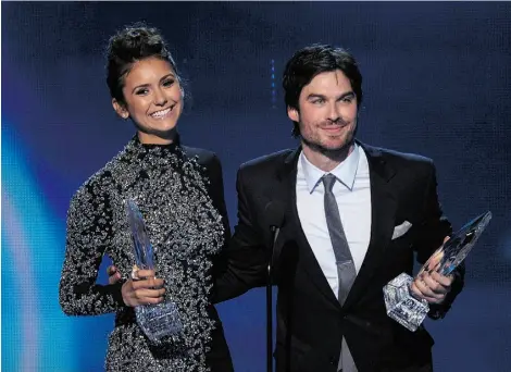  ?? KEVIN WINTER /GET TY IMAGES ?? Actors Nina Dobrev and Ian Somerhalde­r take home the Favorite On Screen Chemistry award for The Vampire Diaries.