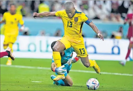  ?? AP ?? Qatar's goalkeeper Saad Al Sheeb brings down Ecuador's Enner Valencia during the opening Group A match of the 2022 World Cup at the Al Bayt Stadium in Al Khor, Qatar on Sunday.