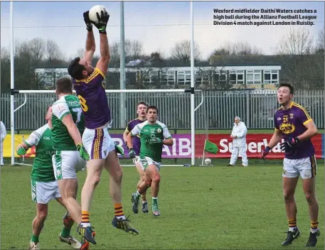  ??  ?? Wexford midfielder Daithí Waters catches a high ball during the Allianz Football League Division 4 match against London in Ruislip.