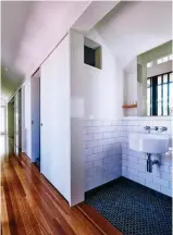  ??  ?? LEFT: Most seating areas in the living spaces cleverly disguise storage spaces. ABOVE: Dividing the bathroom into separate areas reduces queues. TOP: The placement of plants and the use of natural fibres in fixtures and fittings reflect Brisbane’s sub-tropical climate.