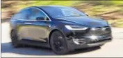  ?? Mark Boster Los Angeles Times ?? TESLA revenue rose 36% largely because it delivered more Model S sedans and Model X crossovers, above.