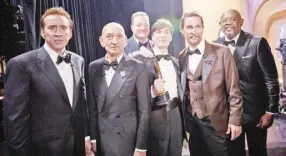  ?? - PHOTO BY AL SEIB/AMPAS ?? Cillian Murphy (center) backstage with the Oscar for Actor in a Leading Role with Nicholas Cage, Sir Ben Kingsley, Brendan Fraser, Matthew McConaughe­y and Forest Whitaker.