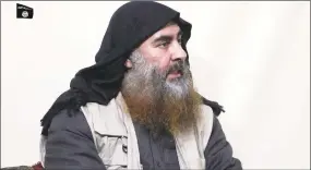  ?? Associated Press ?? This file image made from video posted on a militant website April 29 purports to show the leader of the Islamic State group, Abu Bakr alBaghdadi, being interviewe­d by his group's AlFurqan media outlet.