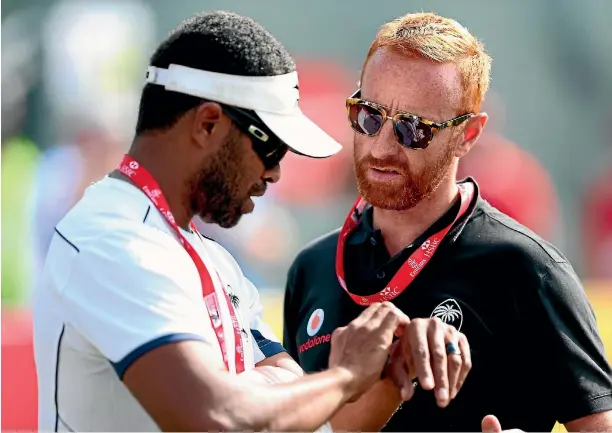  ?? GETTY IMAGES ?? Ben Ryan, right, defied the odds to lead Fiji to sevens glory.