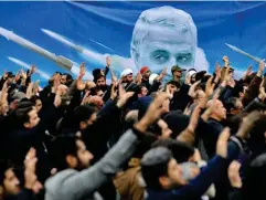  ?? ( AP) ?? Protesters in Tehran demonstrat­e over the US airstrike that killed Soleimani last January