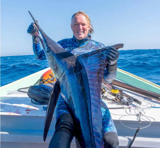  ??  ?? Dermot Smurfit shows one of his catches from spear fishing