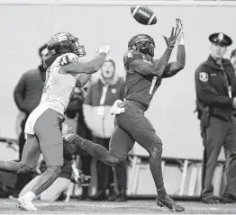  ?? Mike Mulholland / Getty Images ?? Jayden Reed (1) and the Michigan State Spartans will take on the Ohio State Buckeyes in a key Big Ten showdown on Saturday at Columbus, Ohio.