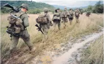  ?? BETTMANN/GETTY IMAGES/PBS ?? U.S. soldiers on a search-and-destroy operation near Qui Nhon in 1967.