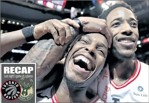  ?? FRANK GUNN/THE CANADIAN PRESS ?? Raptors’ Kyle Lowry (right) and DeMar DeRozan celebrate after defeating the Bucks at the Air Canada Centre last night. DeRozan set a franchise record with 52 points in the win.