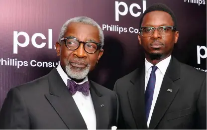  ??  ?? L-R: Foluso Phillips, chairman Phillips Consulting Group and Robert Taiwo, managing director, Phillips Consulting