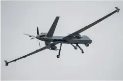  ??  ?? Un des MQ-9 relevant des forces spéciales de l’air Force. Le Reaper dispose d’une plus grande endurance que le Predator et d’une charge utile plus large, avec une capacité d’emport plus importante. Entré en service en 2007, il devrait encore évoluer, l’endurance devant être augmentée. (© US Air Force)