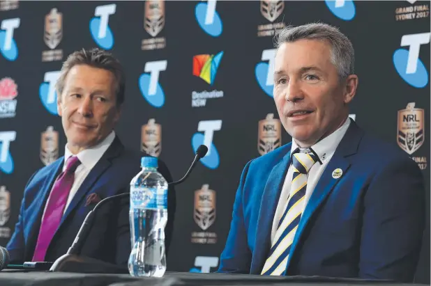  ??  ?? QUESTION TIME: Storm coach Craig Bellamy (left) faces off in a press conference with Cowboys mentor Paul Green. Picture: ADAM HEAD