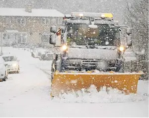  ?? Picture: PPA. ?? A Tayside Contracts snowplough clears Quarry Road, Perth.