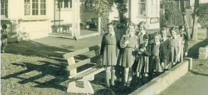  ?? Photo / unknown, courtesy of Mrs Gillian Corballis ?? Pupils in the garden of Christ Church Preparator­y School for Girls, around 1951.