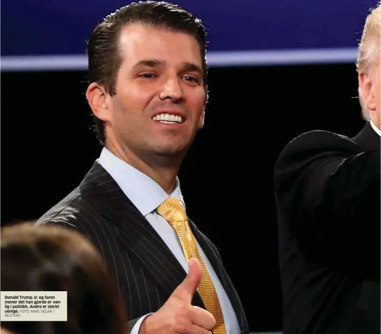  ?? FOTO: MIKE SEGAR / REUTERS ?? Donald Trump Jr. og faren mener det han gjorde er vanlig i politikk. Andre er sterkt uenige.