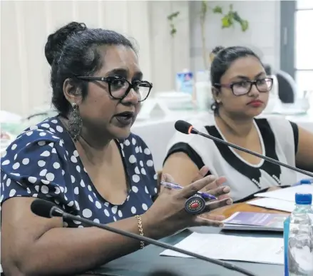  ?? Photo: Fonua Talei ?? Fiji Women’s Rights Movement Director Nalini Singh, left, and research officer Artika Singh present the FWRM submission before the parliament­ary Standing Committee on Justice, Law and Human Rights on April 12, 2018.