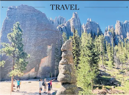  ?? WEB BEHRENS/FOR THE CHICAGO TRIBUNE PHOTOS ?? The Cathedral Spires trail in Custer State Park.