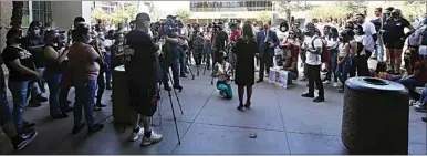  ?? PHOTOS BY ALEX HORVATH / THE CALIFORNIA­N ?? Kern County District Attorney Cynthia Zimmer answers questions from reporters, friends and family of Patricia Alatorre who gathered for Justice for Patricia on Tuesday outside Kern County Superior Court in downtown Bakersfiel­d.