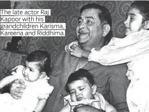  ??  ?? The late actor Raj Kapoor with his grandchild­ren Karisma, Kareena and Riddhima.